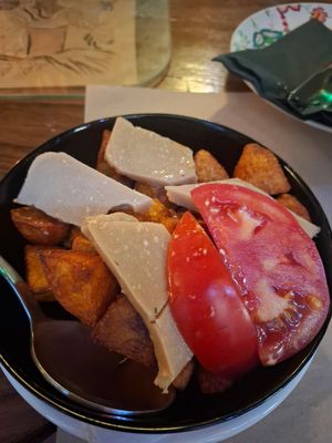 Potatoes and vegan cheese at Mayka in Belgrade