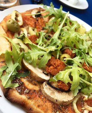 Vegan pizza with smoked Seitan  at Mayka in Belgrade