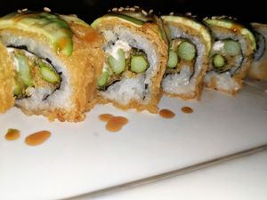 Dragon Roll add vegan cream cheese and deep fried at UCHU Sushi in Portland
