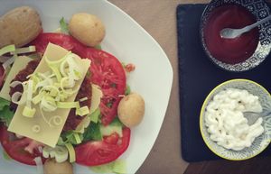 Burger with vegan chesse and baked potatoes at Bioloco in Gran Canaria