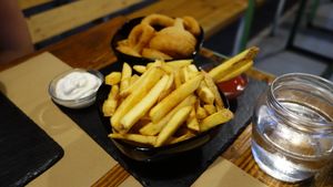 French fries & onion rings with mayonnaise and ketchup at Bioloco in Gran Canaria