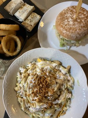 Onion rings, mini burrito’s, Caesar salat, chicken burger at Bioloco in Gran Canaria
