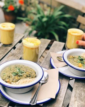 Vegan saag and our very own turmeric latte made from stratch using organic turmeric root (not powdered).  at Sprout Health Foods in Newquay