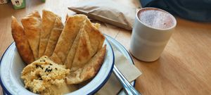 Gluten free vegan flatbread & houmous. at Sprout Health Foods in Newquay