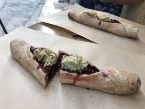 Delicious warm whole wheat dough with beetroot and hummus  at Feyrouz in Athens