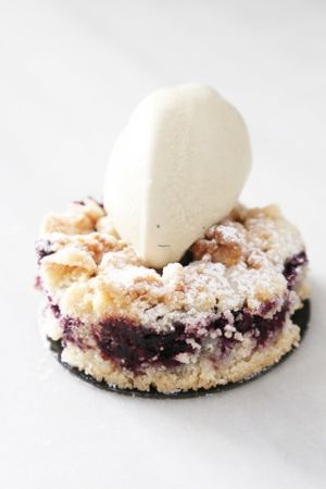 Vegan and gluten free almond flour crumble with gelato on top. No, you are not dreaming. This is real. at Uay Balam in Barcelona