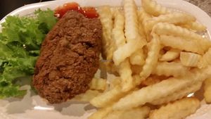 chicken cutlet with fries  at Veggie King in Central Singapore