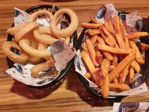 Sweet potato fries and onion rings at The Diner - Strand in London