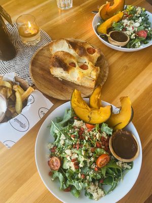 Foccacia, chips and two pumpkin salad, one vg and one veggie  at Mowie's  in 