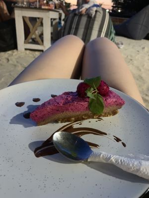 Dragonfruit and cashew cheesecake! The cheesecakes was really yum. The choc sauce was really bitter but would still order again for the main thing, the cheesecake! at Mowie's  in 