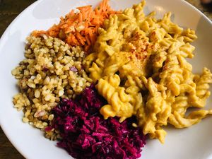 Sunflower pasta with mixed homemade salads  at The Planet Cafe in Taunton