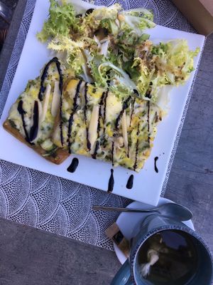 creamy pizza slices w/ green pesto at L'Eden Sans Gluten in Strasbourg