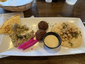 Sampler platter with double hummus, baba ganoush, and falafel   at Olea Mediterranean Kitchen in Swansboro