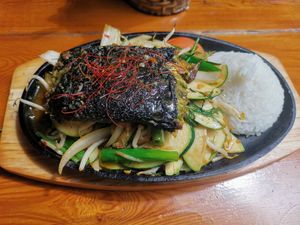Tofu with Oyster Mushrooms and homemade black sauce at Hum Vegan Cuisine in Berlin