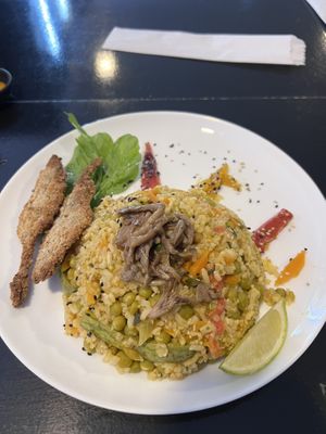 Paella com peixinho da horte bem crocante  at SuBte Vegan in Sao Paulo