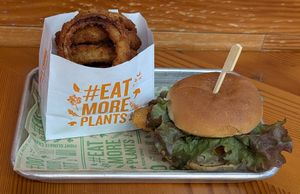 onion rings and Crispy Chik'n Burger at Next Level Burger - Lake Oswego in Lake Oswego