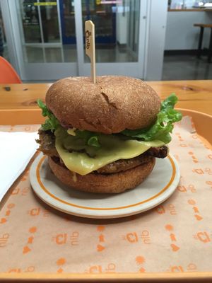 Sausage style burger with tempeh bacon at Next Level Burger - Lake Oswego in Lake Oswego