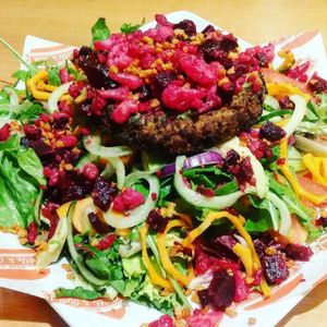 Vegan burger on salad at Steak Cattle & Roll - Sauchiehall St in Glasgow