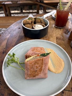 Breakfast burrito and crumbed mushrooms   at The Shady Shack in Canggu