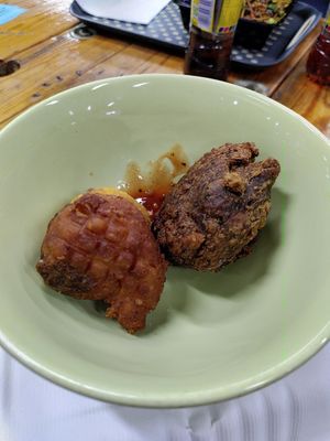Two dumplings, left sourdough and garlic, right: spinach at Zionly Manna in South East London