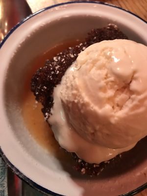 Vegan sticky toffee pudding and ice cream at The Deaf Institute Bar and Kitchen in Manchester