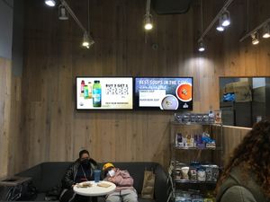 Seating (not a lot, but a welcome place to sit for this tired couple of tourists) at Juice Press - Hell's Kitchen in New York City