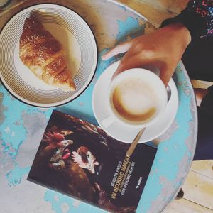 typical italian breakfast (with book) at Bar Lento in Rimini