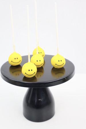 Smiley face cake pops  at Vegan Art by Indira in Miami