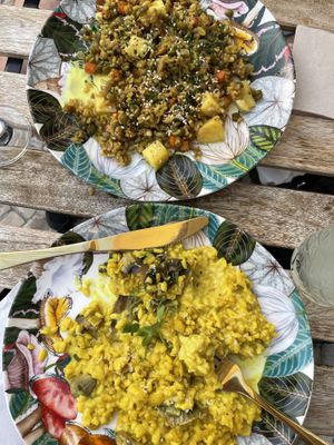 Thai brown coconut rice with pineapple and nuts/seeds + turmeric risotto with mushrooms and leek  at O Xexexe in Costa Da Caparica
