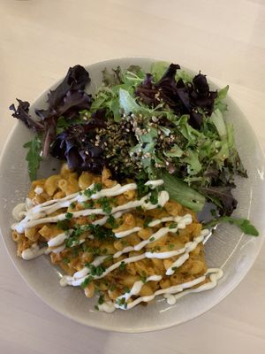 Mini portion of Mac and cheese with salad and sour cream (amazing) at O Xexexe in Costa Da Caparica