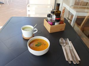 Pumpkin soup as starter with matcha latte soya at Alfarroba Cafe in Albufeira