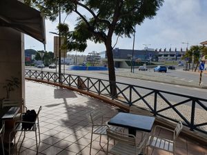 The Globe roundabout, busy road at Alfarroba Cafe in Albufeira