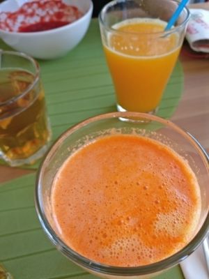 Freshly made orange and carrot juice at Alfarroba Cafe in Albufeira