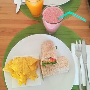 Tofu wrap with a strawberry smoothie at Alfarroba Cafe in Albufeira