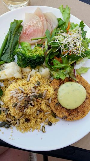 tempeh burger but without the bun and instead as a side of the main dish at Alfarroba Cafe in Albufeira