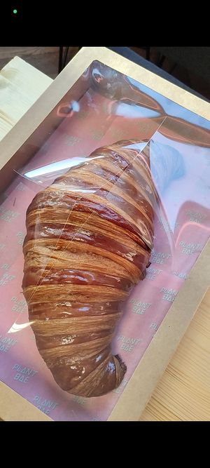 Giant croissant at Hey Plant Bae in Edinburgh