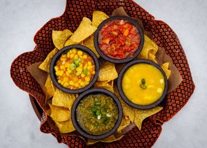 Fresh, made in house salsa's. Featuring our fresh salsa, salsa verde, corn and mango salsa.  at Burrito Grill in Kimberley