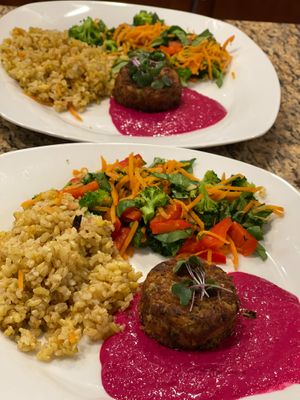 Beet Hummus plate with sundries tomato cake and golden rice.  We split a lot of the meals into two lunches!  This is one meal split.  at Sprinly in Cleveland