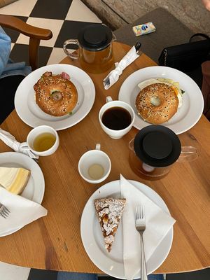 tea, coffee, bagels and a cheese cake (not vegan) at Kawiarnia Stragan in Poznan