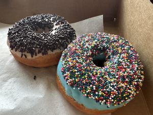 Blueberry Frosted W/Sprinkles and Cinnamon Frosted W/Chocolate Sprinkles  at The Crumb in Yucaipa