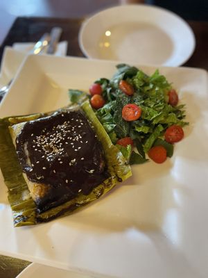 Tamal de mole negra at Le Campane in Oaxaca