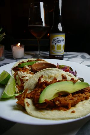 Tacos al pastor de seitan: four tacos of pastor seitan, pineapple, onion, avocado, pico de gallo and salsa at Le Campane in Oaxaca