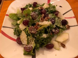 Ensalada con lechuga, uvas, nueces, manzana, y coco rallado  at Le Campane in Oaxaca