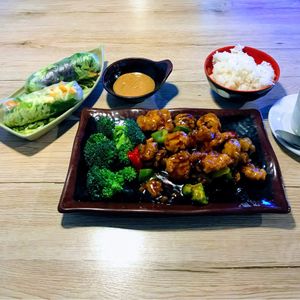 General Tso half-and-half mushroom/chicken and Vietnamese rolls. Delicious! at Veggie Village in Phoenix