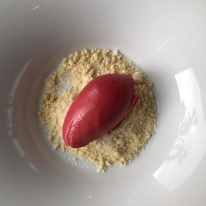 RASPBERRY SORBET on a whitechocolate, sugar vanilla crumble at Restaurang Sand in Bastad