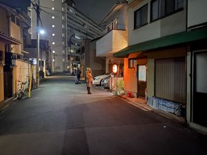 Street side entrance at night. Look out for red ラメン lantern at Vegan Ramen Towzen in Kyoto