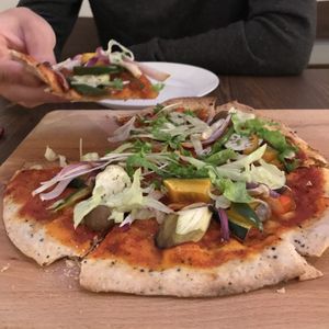 Vegetarian quinoa base pizza asked for without cheese. Lovely and thin and crispy. at La Quinua in Kagoshima