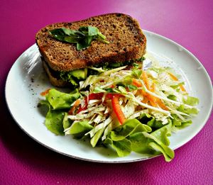 Sandwich with homemade pesto, sourdough bread and fresh salad. at Yoga House & Spa in Koh Samui