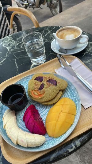 Vegan banana oat pancakes and macadamia nut milk latte  at Coco&Co in Vientiane