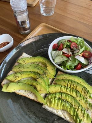 Avocado toast, ask for additional salt and chilli as it’s quite bland  at Coco&Co in Vientiane
